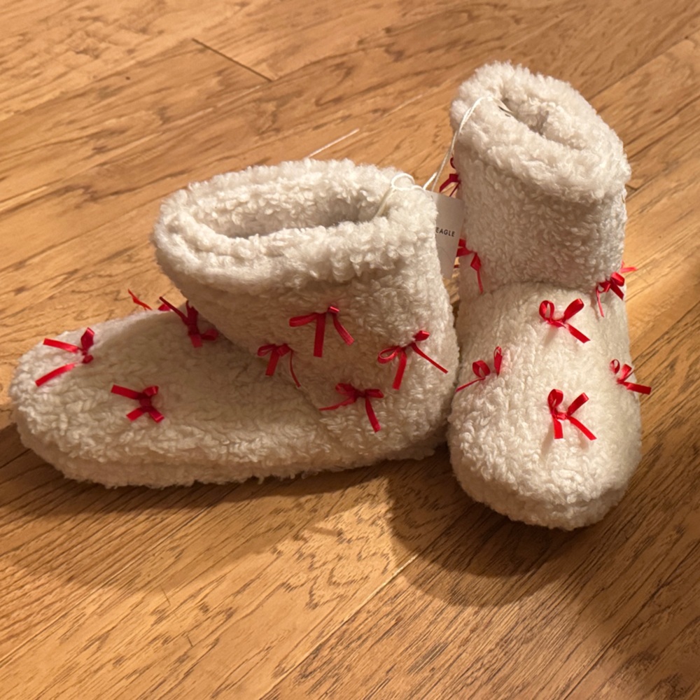 American Eagle Outfitters Cream Fuzzy Slippers with Red Bows